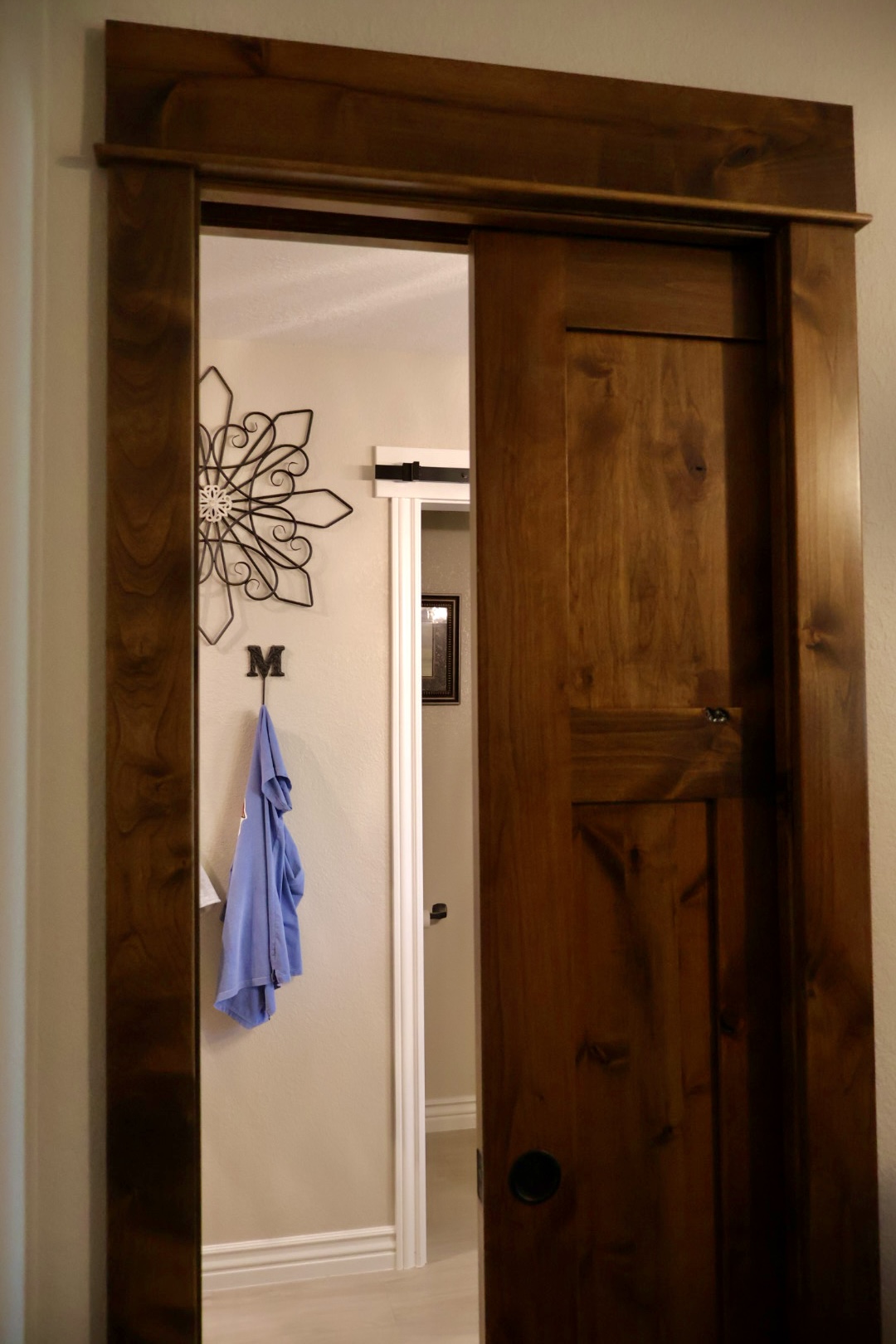 Alder pocket door and matching wood casing